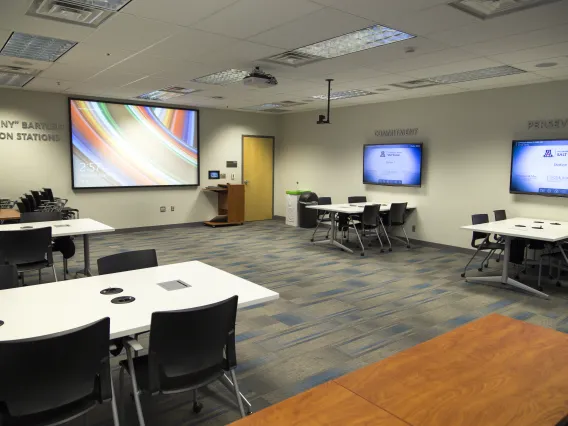 Classroom with large LED screens and projector