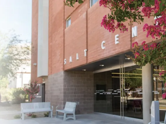 SALT Center building with pink flowers in front