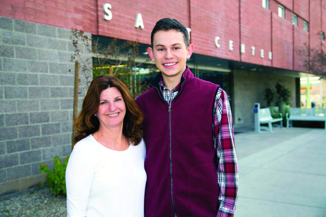 Andrew standing with his advisor Rose