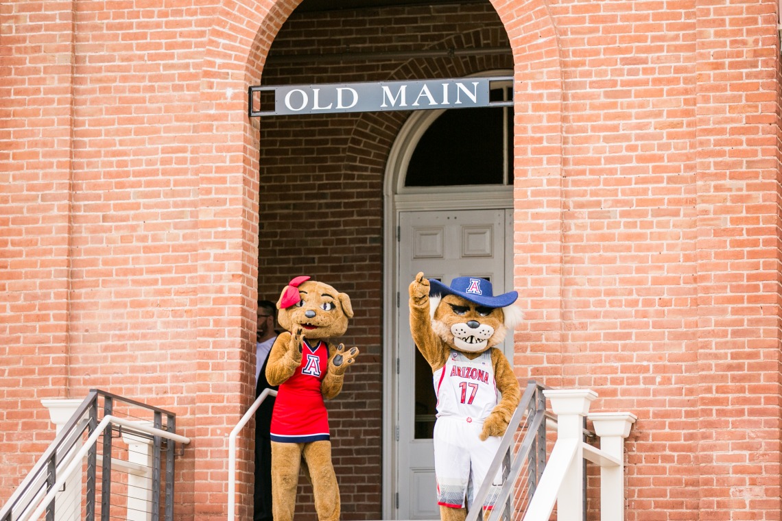 Photo of Wilbur and Wilma (mascots) standing at the front of Old Main