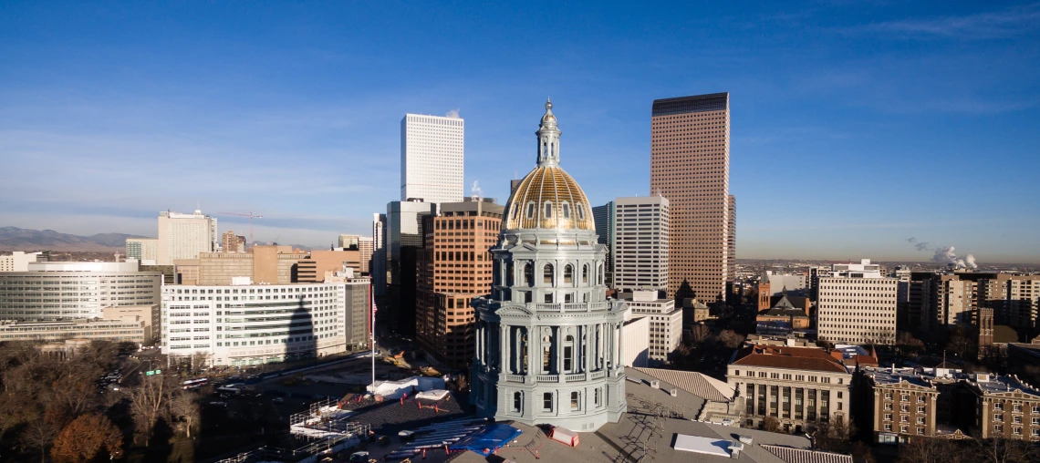 Denver, Colorado capital building and skyscrapers cityscape