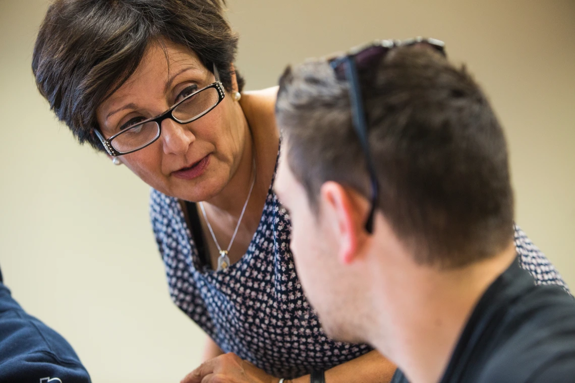 Professor talking to a student