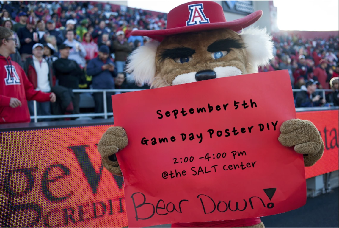 Photo of Wilber Wildcat holding a sign for this event