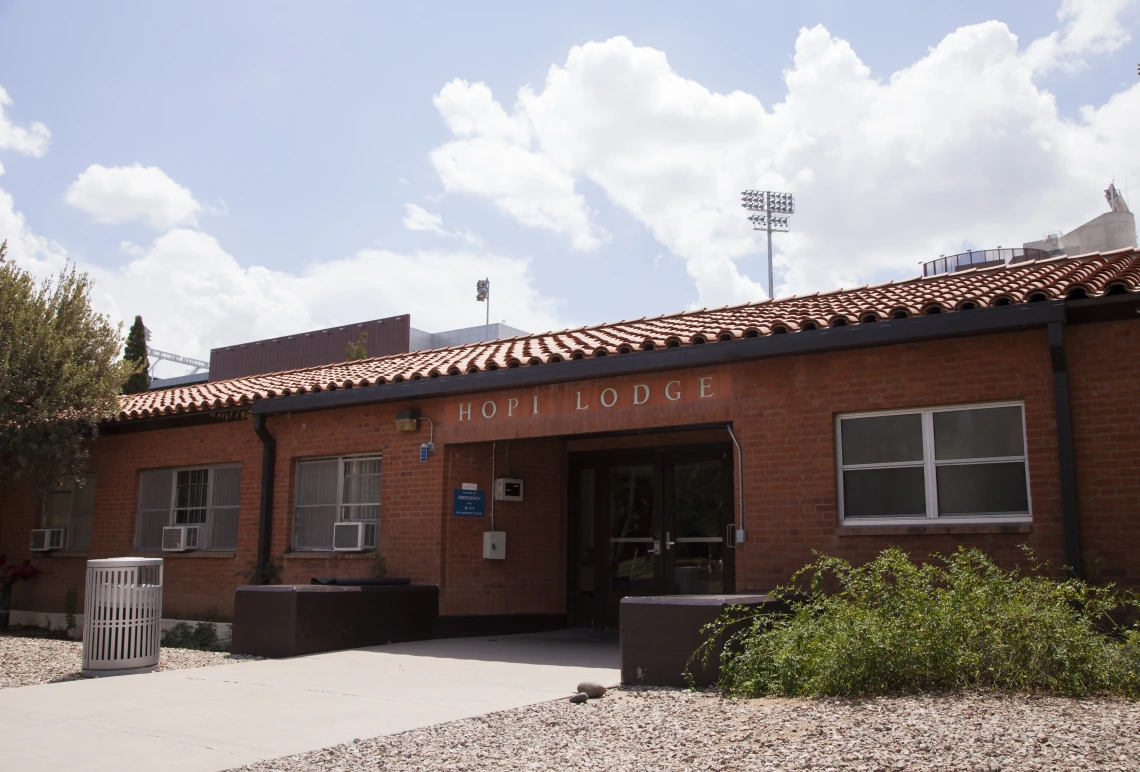 Red Brick building with signage that reads "HOPI LODGE"