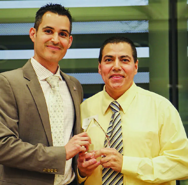 Albert being awarded the Director's Award