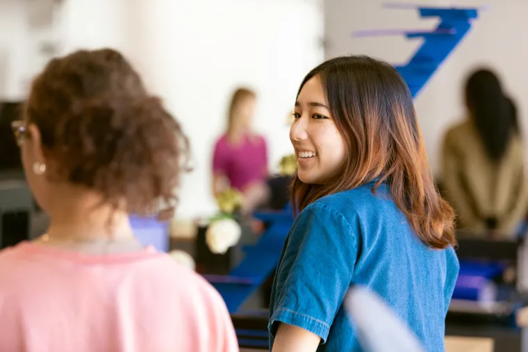 Student looking at other student