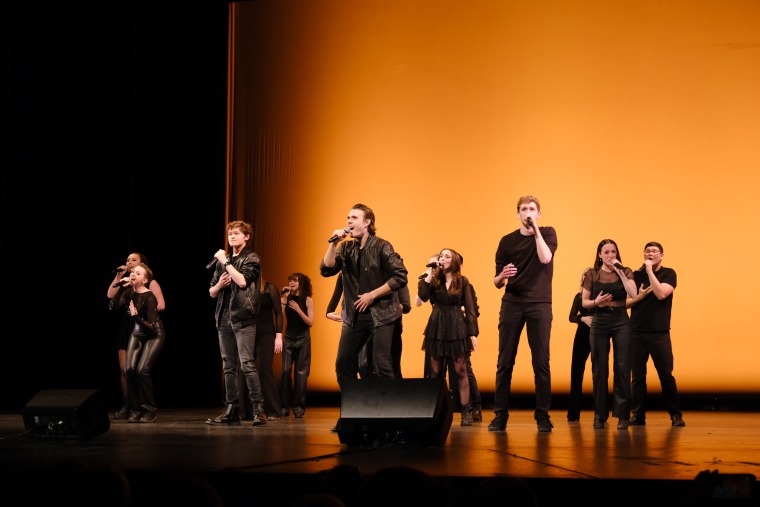 Sam Bever performing with his acapella group