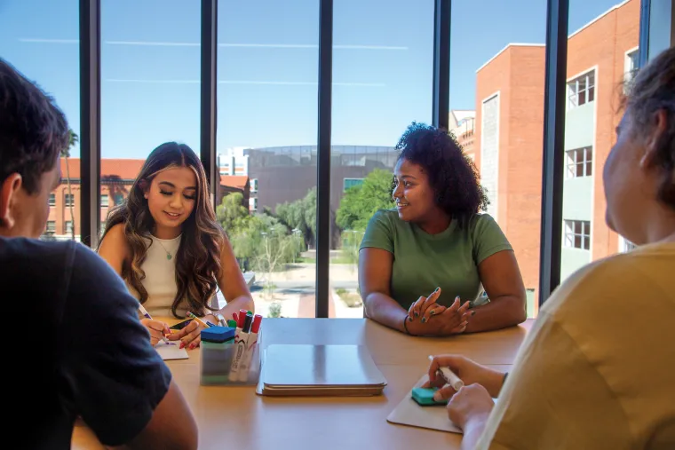 Students studying around table