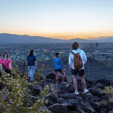 Students on Tumamoc Hill overlooking the Tucson landscape