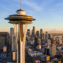 Cityscape of Seattle featuring the Space Needle, skyscrapers, and sea